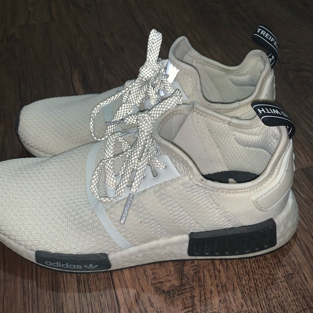Black and cream Adidas NMDs
